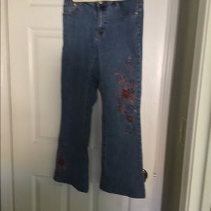 Decorated blue jeans size 6.